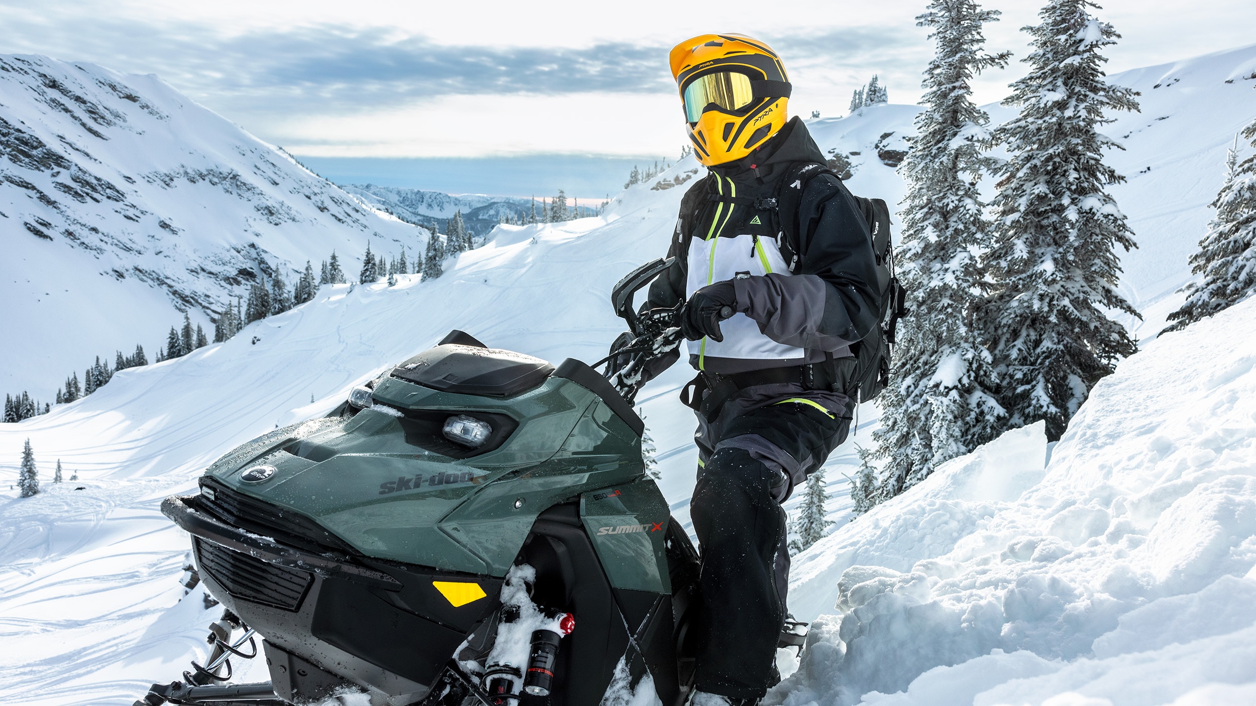 Rider wearing Ski-Doo snowmobile gear