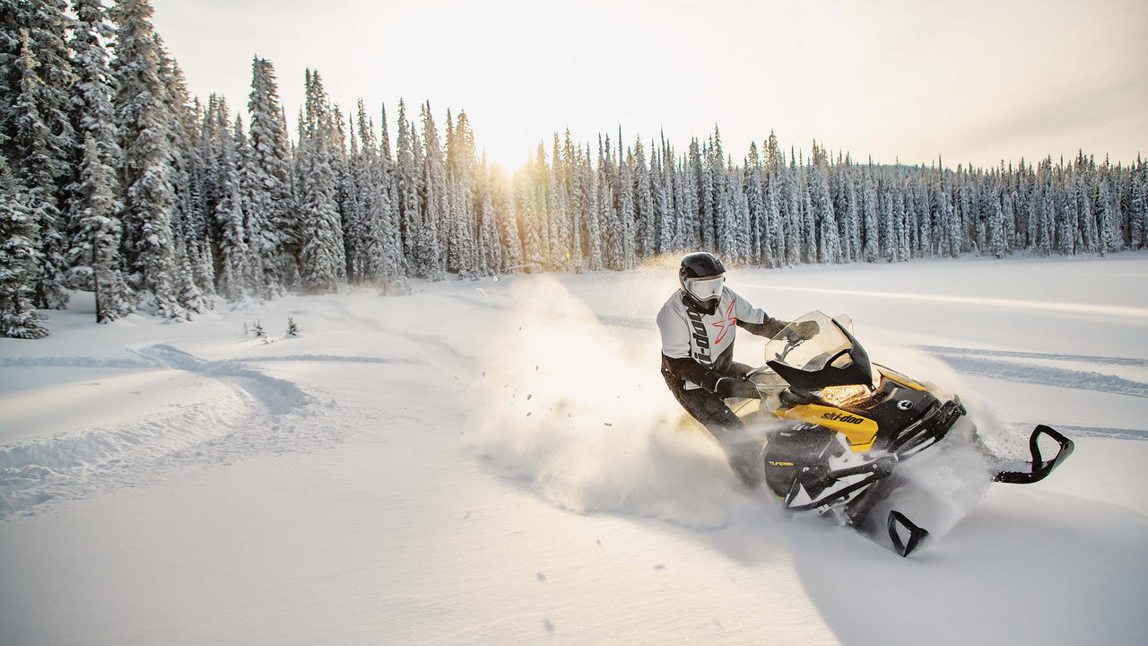 Rider riding a Ski-Doo Tundra in deep snow