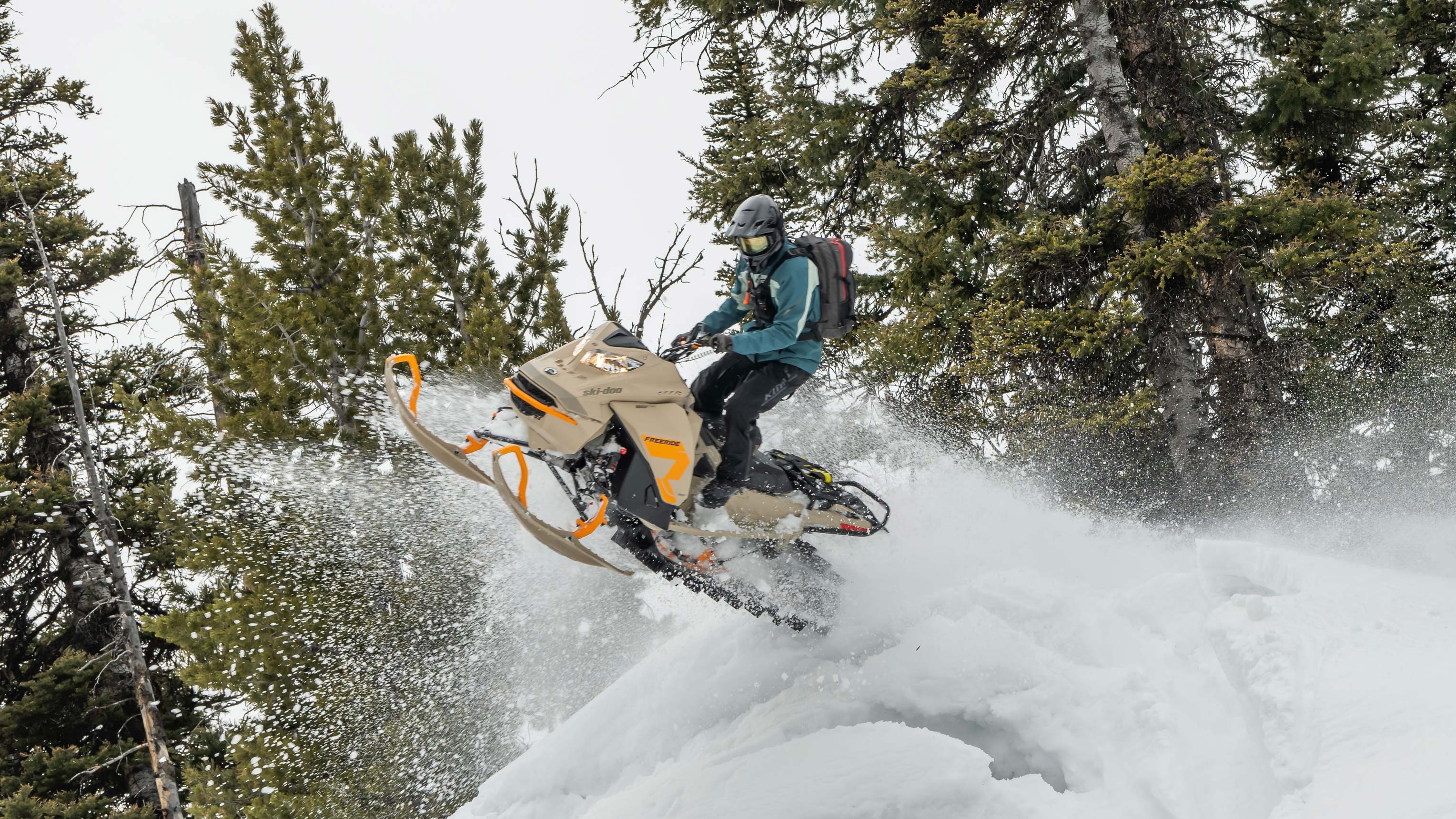 Ski-Doo Ambassador Mason Rutledge jumping with a Freeride