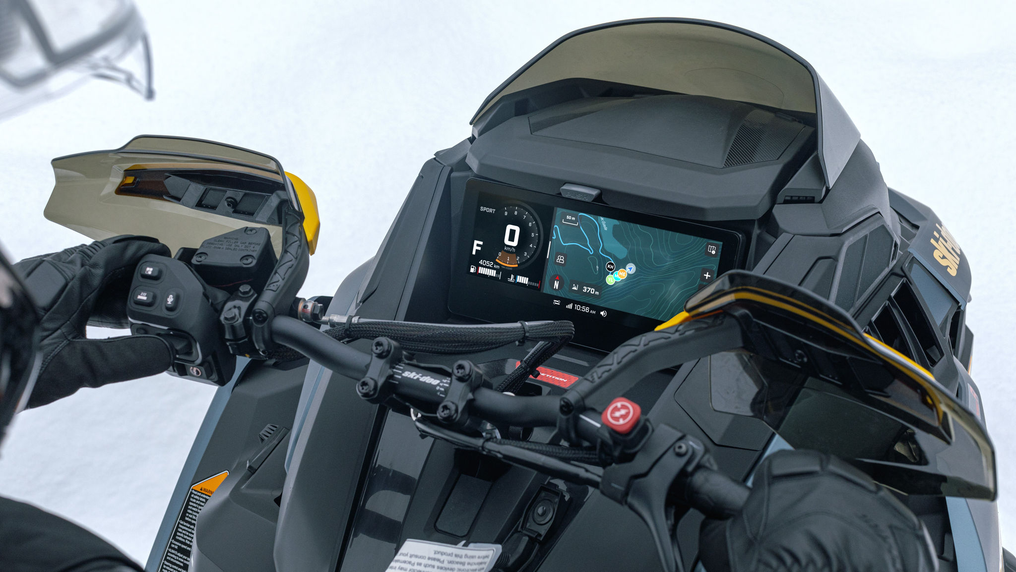 Handlebars and dashboard of the 2026 Ski-Doo MXZ snowmobile