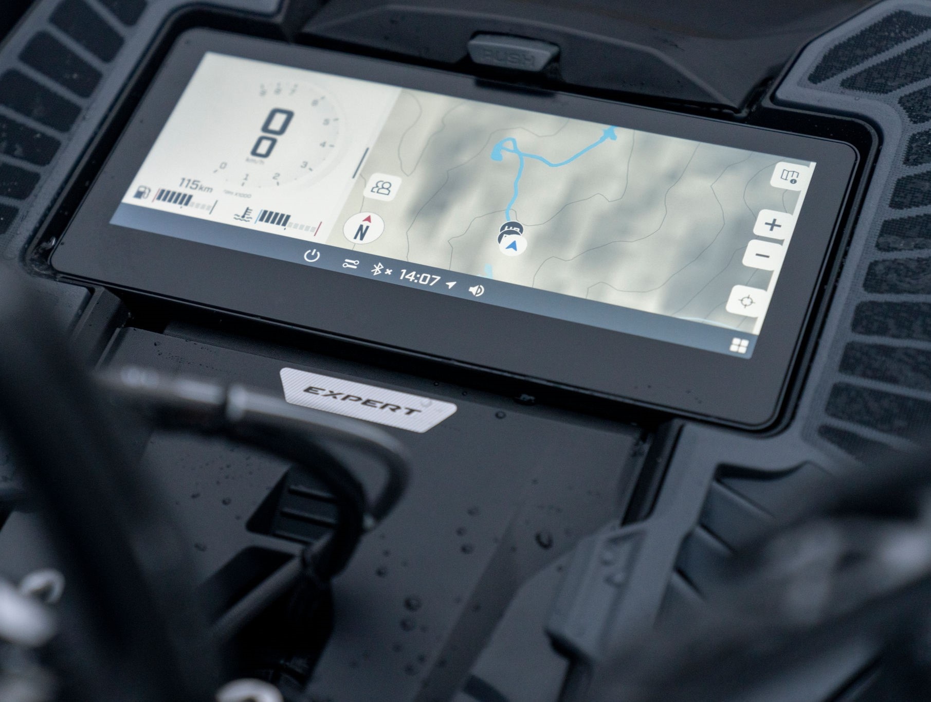 Close-up of the Ski-Doo Summit 2026 snowmobile's 10.25” touchscreen displaying the map.