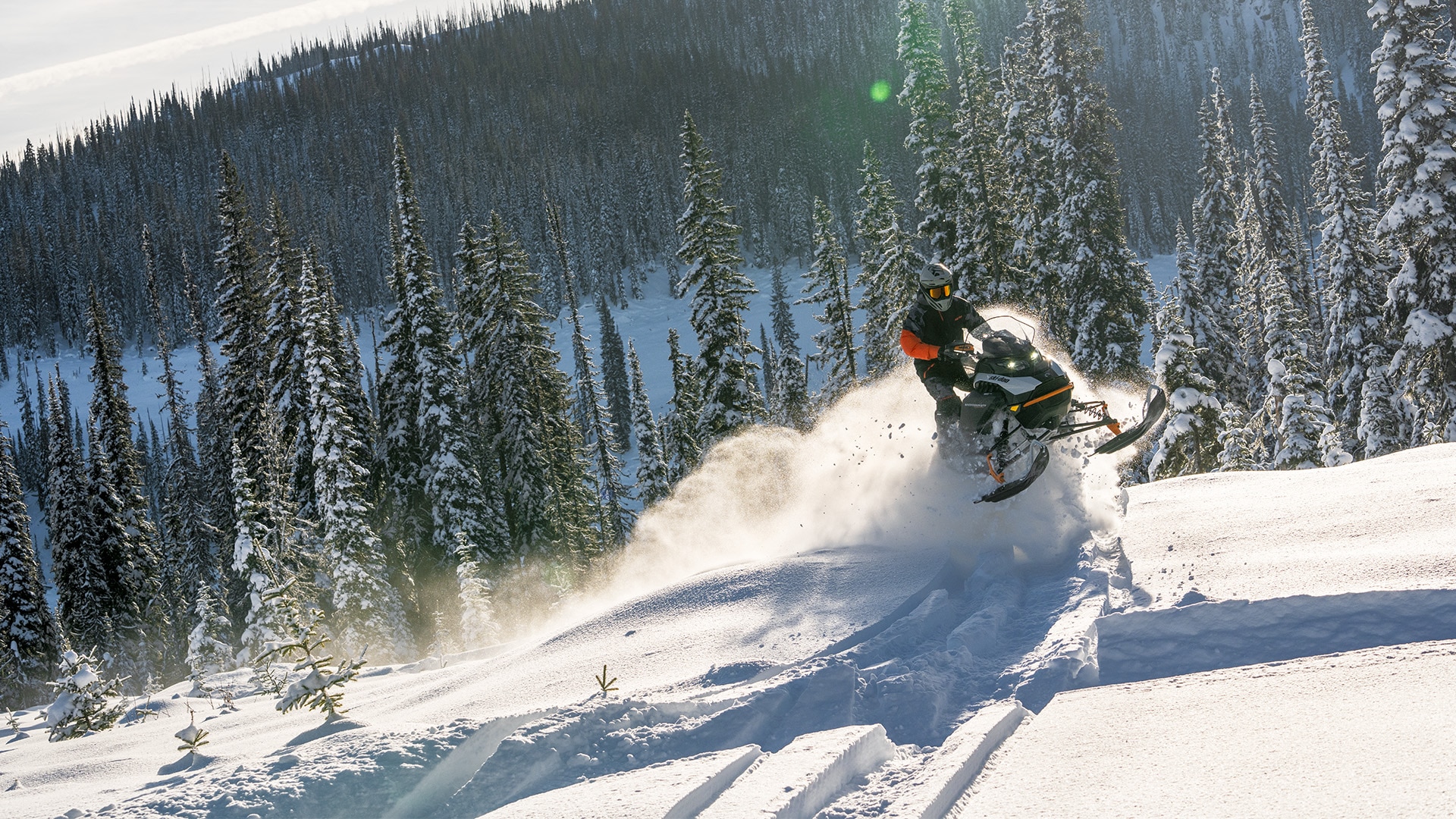 2026 Ski-Doo Backcountry riding up a snowy mountain