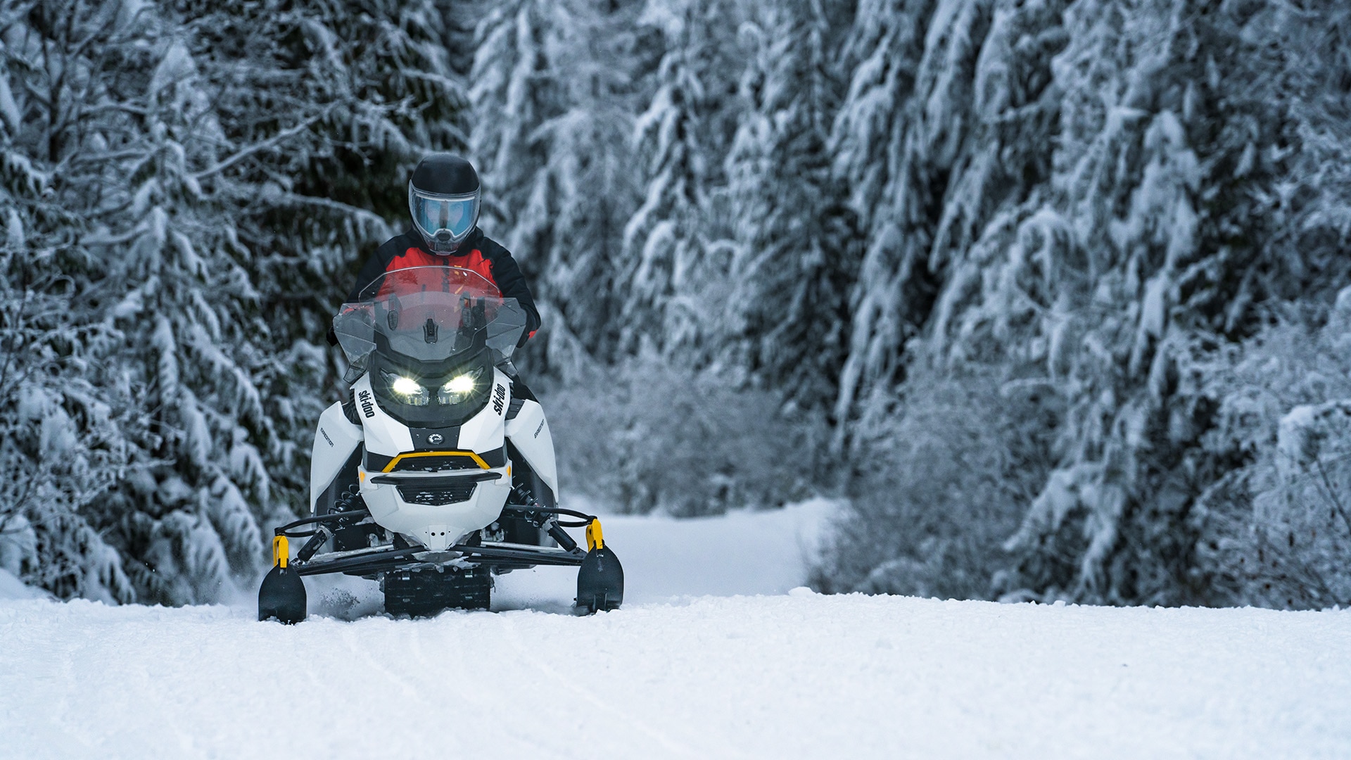 Rider riding a 2026 Ski-Doo Expedition electric snowmobile