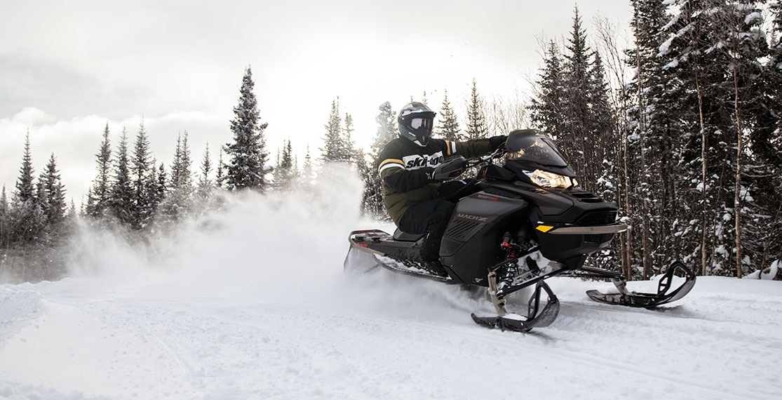 Driver going fast on a 2022 Ski-Doo Mach Z 