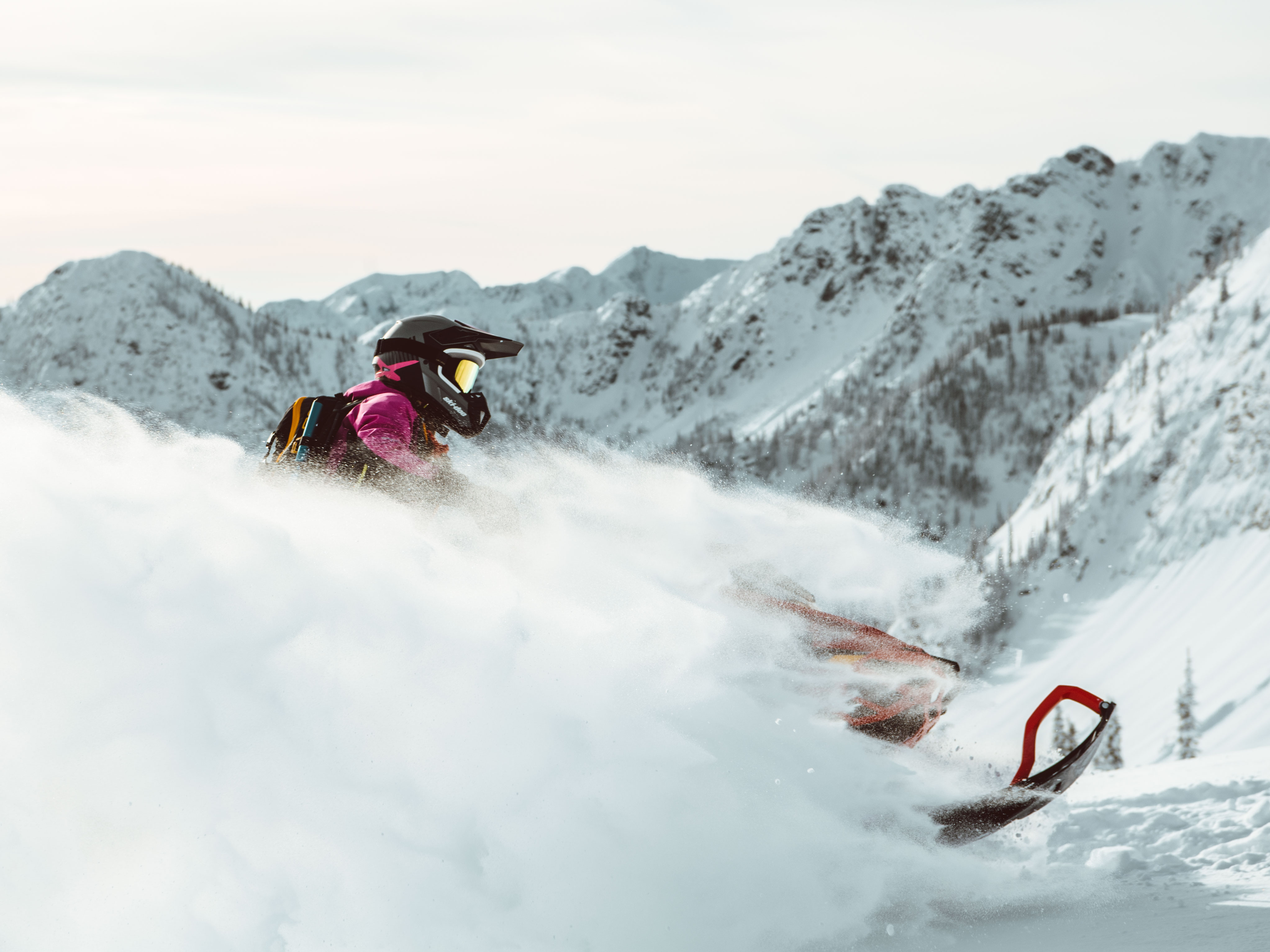 Ashley Chaffin jumping in Deep-Snow with her Ski-Doo Summit