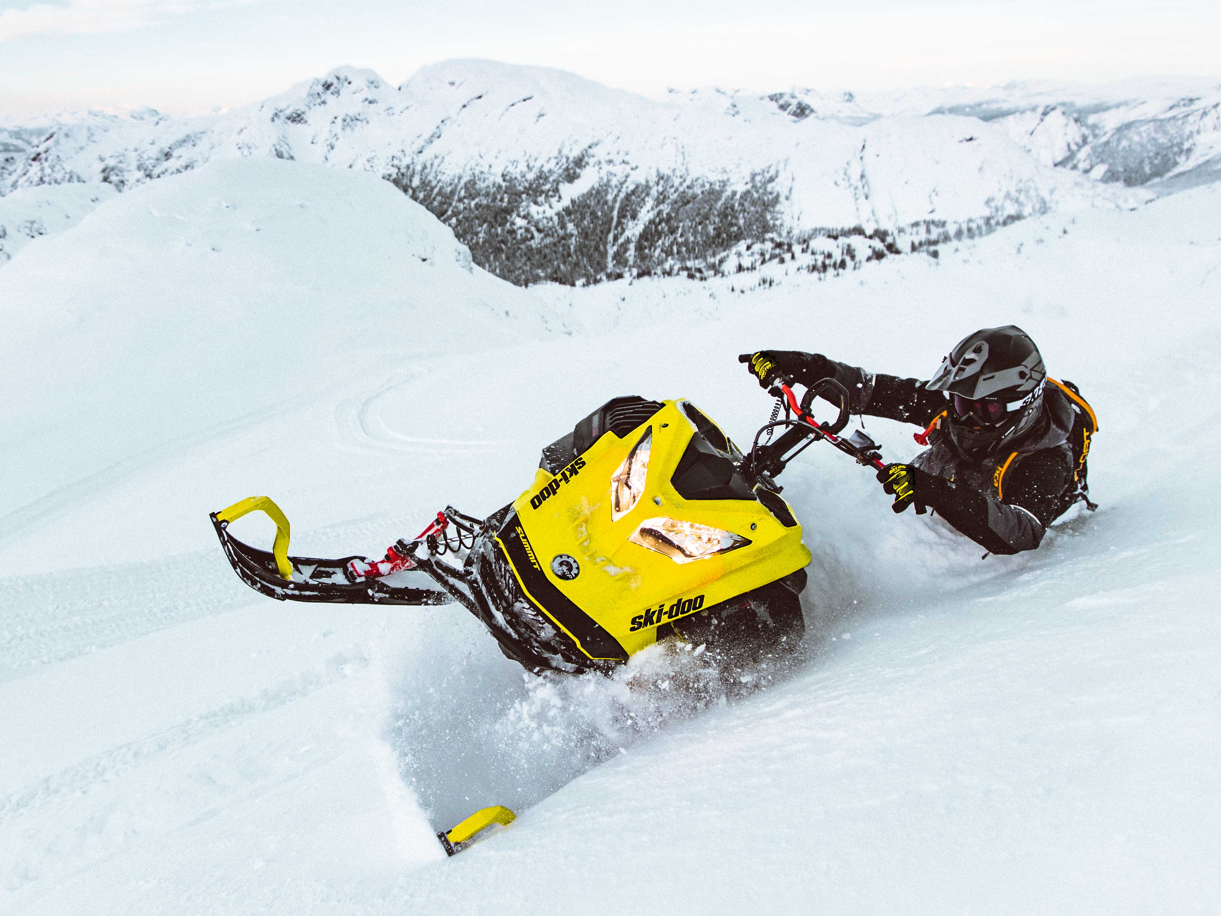 Carl Kuster riding in Deep-Snow with his Ski-Doo Summit